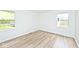 This bedroom features light-colored walls and flooring and has bright natural light at 19446 Ethan Allen Ln, Westfield, IN 46074