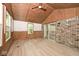 Cozy sunroom with natural light and brick accents at 19446 Ethan Allen Ln, Westfield, IN 46074