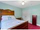 Bright bedroom features a ceiling fan, natural light and period furniture at 19702 Centennial Rd, Sheridan, IN 46069