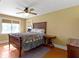 Cozy bedroom features a ceiling fan, natural light and classic decor at 19702 Centennial Rd, Sheridan, IN 46069