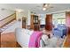 Spacious living area featuring hardwood floors, traditional furnishings, and an open layout at 19702 Centennial Rd, Sheridan, IN 46069