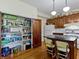Well-organized pantry with shelving and ample storage space, adjacent to kitchen at 19702 Centennial Rd, Sheridan, IN 46069
