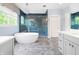 Stunning bathroom with a soaking tub, large window, and glass shower at 20400 Chatham Hills Blvd, Westfield, IN 46074