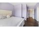 Lavender bedroom featuring hardwood floors and natural light from the window at 20400 Chatham Hills Blvd, Westfield, IN 46074