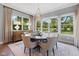 Dining room has large window and light fixture and is decorated with modern accents at 20400 Chatham Hills Blvd, Westfield, IN 46074
