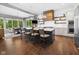 Eat-in kitchen features a large island with seating, pendant lights, and stainless steel appliances at 20400 Chatham Hills Blvd, Westfield, IN 46074