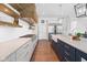 Spacious kitchen with large island, stainless steel appliances, and adjacent pantry at 20400 Chatham Hills Blvd, Westfield, IN 46074