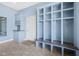 Charming mudroom featuring custom built-ins, storage cubbies, and a convenient bench area at 20400 Chatham Hills Blvd, Westfield, IN 46074