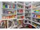 Spacious walk-in pantry features custom shelving to keep your food organized at 20400 Chatham Hills Blvd, Westfield, IN 46074