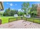 Enjoy this large wood deck overlooking a private backyard and storage shed perfect for storing all your outdoor needs at 206 Cranberry Dr, Greenfield, IN 46140
