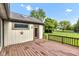 Spacious wood deck for outdoor relaxation and overlooking a large backyard at 206 Cranberry Dr, Greenfield, IN 46140