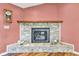 Cozy fireplace with stone surround and decorative mantel, perfect for gatherings at 206 Cranberry Dr, Greenfield, IN 46140