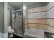 Bright bathroom showcasing a jetted tub, a shower, and modern fixtures at 2134 N Alabama St, Indianapolis, IN 46202