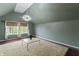 Spacious bedroom features a light fixture, a large window and new wood flooring at 2134 N Alabama St, Indianapolis, IN 46202