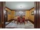 A beautifully staged formal dining room offers an inviting ambiance with seating for six and ornate chandelier at 2134 N Alabama St, Indianapolis, IN 46202