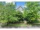 Two-story home with classic design and a well-manicured front yard and trees at 2134 N Alabama St, Indianapolis, IN 46202