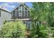 Well-maintained home with manicured landscaping and charming front porch at 2134 N Alabama St, Indianapolis, IN 46202