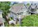 Well-maintained two-story home features a classic Tudor style and mature trees at 2134 N Alabama St, Indianapolis, IN 46202