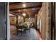 Open-concept living and dining area with a decorative ceiling, chandelier, and a cohesive design at 2134 N Alabama St, Indianapolis, IN 46202