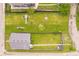 Aerial view of a property showcasing its expansive backyard, play area, and overall lot layout at 2230 Pleasant St, Indianapolis, IN 46203