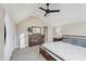 Bedroom with vaulted ceiling, a dresser, a bed, and a window at 2230 Pleasant St, Indianapolis, IN 46203