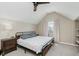 Bedroom featuring vaulted ceilings and natural light at 2230 Pleasant St, Indianapolis, IN 46203