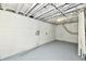 Unfinished basement with painted walls, exposed ceiling, and utility connections at 2966 N Olney St, Indianapolis, IN 46218