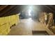 Expansive attic space with wood floors and insulation offers potential for customization at 3324 S Walnut St, Muncie, IN 47302