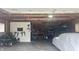 Well-organized garage featuring ample storage and workspace for projects and parking at 3324 S Walnut St, Muncie, IN 47302