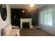 Cozy living room features a fireplace, lots of natural light, and a comfortable seating area at 3324 S Walnut St, Muncie, IN 47302