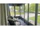 Relaxing sunroom featuring large windows providing plenty of natural light and a great view at 3324 S Walnut St, Muncie, IN 47302