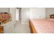 Neutral bedroom featuring twin closets and a peek into the hallway at 3537 Woodglen Way, Anderson, IN 46011