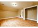 Large bedroom with hardwood floors, a ceiling fan, and a closet at 4130 N Meridian St, Indianapolis, IN 46208