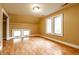 Bright bedroom featuring hardwood floors and plenty of natural light from windows at 4130 N Meridian St, Indianapolis, IN 46208