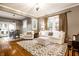 Bright living room with a seamless flow between dining area and comfortable seating, enhanced by natural light at 4130 N Meridian St, Indianapolis, IN 46208