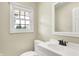 Bright bathroom featuring a modern vanity, updated fixtures and plenty of natural light at 4197 E 250 S, Franklin, IN 46131
