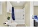 Well-lit bathroom features a shower and tub combo and a ceramic tile floor at 4197 E 250 S, Franklin, IN 46131