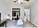 Bedroom with closet and ceiling fan, featuring ample space and neutral tones at 4197 E 250 S, Franklin, IN 46131