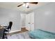 This bedroom boasts hardwood floors, an open door to the hallway and natural light at 4197 E 250 S, Franklin, IN 46131