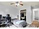 Spacious bedroom with hardwood floors, closet, and a ceiling fan at 4197 E 250 S, Franklin, IN 46131