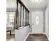 Inviting entryway with a decorative front door and wood-look floors at 4197 E 250 S, Franklin, IN 46131