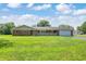 Charming brick ranch with a large front yard, attached two car garage, and a covered front porch at 4197 E 250 S, Franklin, IN 46131