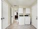 Convenient laundry room with updated washer and dryer, storage cabinets, and easy access at 4197 E 250 S, Franklin, IN 46131