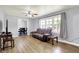 Inviting living room with updated flooring, neutral paint, and access to the dining room at 4197 E 250 S, Franklin, IN 46131