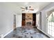 Bright living room features a brick fireplace with custom shelves and unique tile floors at 4197 E 250 S, Franklin, IN 46131