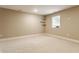 Bedroom featuring neutral walls and carpet, and three floating wall shelves at 4332 Heyward Pl, Indianapolis, IN 46250