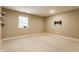 Bedroom featuring neutral walls and carpet, and a wall-mounted TV bracket at 4332 Heyward Pl, Indianapolis, IN 46250