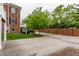 Exterior view of a well-maintained property with lush greenery, including an attached garage at 4332 Heyward Pl, Indianapolis, IN 46250