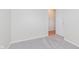 Neutral bedroom featuring carpeted floors and a doorway to the rest of the home at 5083 Emmert Dr, Indianapolis, IN 46221