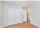 Bedroom with a closet and doorway and hardwood floors at 5083 Emmert Dr, Indianapolis, IN 46221